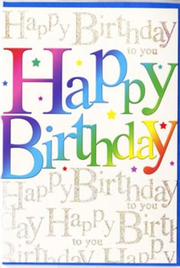 Photographed as though freshly unwrapped in a Barbican flat, this birthday card presents a modern, artful take on a classic greeting. The central message, Happy Birthday, is emblazoned across the front in generous, thick letters that feel both bold and friendly. Each letter holds its own luminous colour, flowing through the full rainbow from deep garnet and burnt orange to sunshine yellow, meadow green, sea blue, indigo, and rich amethyst. The transitions between hues are gentle, almost painterly, reminiscent of the layered tones found in a carefully constructed floral display or the changing light across the Barbican conservatory's greenery. Slight shadows and highlights along the edges of the letters lend a subtle three-dimensional effect, suggesting that the words might gently lift off the page if touched. In the background, a delicate veil of golden script repeats the phrase Happy Birthday to you over and over in looping, cursive handwriting. The gold has a soft metallic sheen, catching the light with a refined sparkle like the glint of evening sun on the nearby Barbican lakes. The script forms a continuous pattern that fills the space behind the main text, providing a sense of movement and warmth without ever crowding the design. Small, scattered dots and star-like shapes in assorted colours float between the words, giving the impression of light confetti suspended mid-air. The card's surface appears smooth, with a semi-gloss finish that enhances the vibrancy of the rainbow letters and the subtle glow of the gold script. Overall, the design suggests thoughtful celebration and contemporary style, ideal to accompany a birthday bouquet delivered through the streets around Barbican, Old Street, or Smithfield, for someone who loves colour, creativity, and heartfelt wishes.